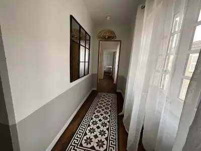 Un ou plusieurs lits dans un hébergement de l'établissement Le Clos Notre Dame hôtel particulier hypercentre