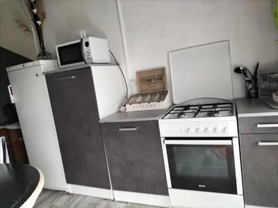 Cuisine ou kitchenette dans l'établissement Studio en toute simplicité