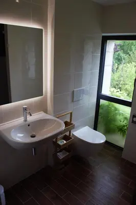 Salle de bains dans l'établissement Les Herbes Folles