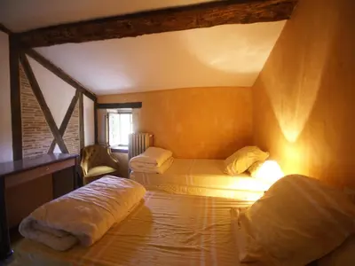 Un ou plusieurs lits dans un hébergement de l'établissement Holiday Home in Thurageau with Private Pool