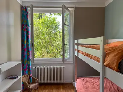 Un ou plusieurs lits dans un hébergement de l'établissement Havre de paix cosy avec jardin proche du centre-ville de Poitiers