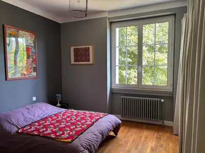 Un ou plusieurs lits dans un hébergement de l'établissement Havre de paix cosy avec jardin proche du centre-ville de Poitiers