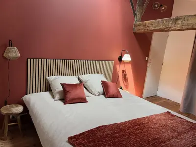 Un ou plusieurs lits dans un hébergement de l'établissement Appartement à la campagne