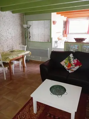 Coin salon dans l'établissement Le Charmant Duplex