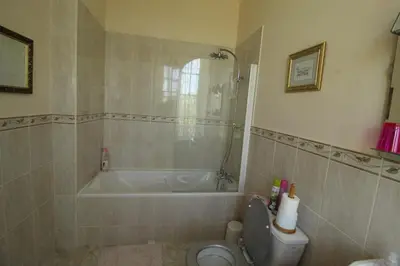 Salle de bains dans l'établissement Manoir Angle
