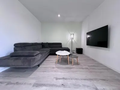Coin salon dans l'établissement Maison 6 personnes