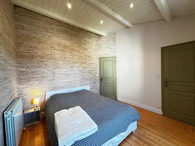 Un ou plusieurs lits dans un hébergement de l'établissement Spacieuse Maison 4 Chambres, Centre Fouras, Proche Plages - FR-1-709-96