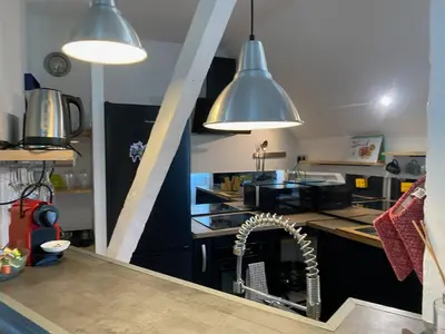 Cuisine ou kitchenette dans l'établissement Bel appartement proche du marché