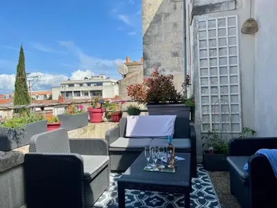 Coin salon dans l'établissement Bel appartement proche du marché