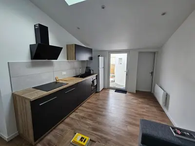 Cuisine ou kitchenette dans l'établissement Accueillant T2 avec terrasse privée