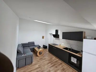Cuisine ou kitchenette dans l'établissement Accueillant T2 avec terrasse privée