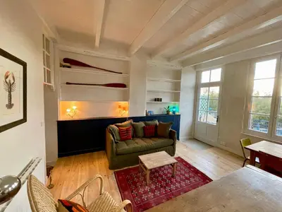 Coin salon dans l'établissement Gîte La Bergeronnette