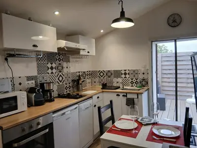 Cuisine ou kitchenette dans l'établissement le coquelicot