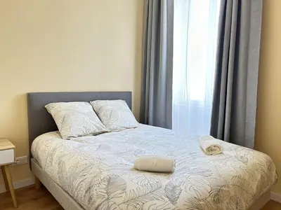 Un ou plusieurs lits dans un hébergement de l'établissement Appartement - 1 chambre - Centre-ville