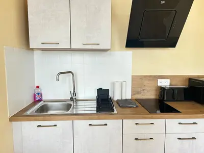 Cuisine ou kitchenette dans l'établissement Appartement - 1 chambre - Centre-ville