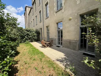 Jardin de l'établissement Le Clos - Centre ville - Jardin - Parking privé