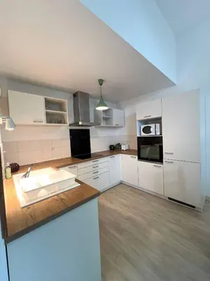 Cuisine ou kitchenette dans l'établissement Le Clos - Centre ville - Jardin - Parking privé