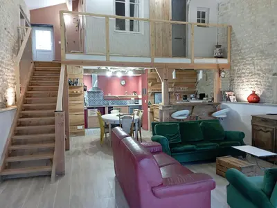 Coin salon dans l'établissement La grange d'Isabelle
