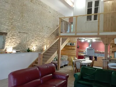 Coin salon dans l'établissement La grange d'Isabelle