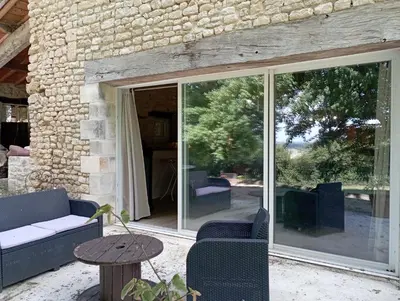 Coin salon dans l'établissement La grange d'Isabelle