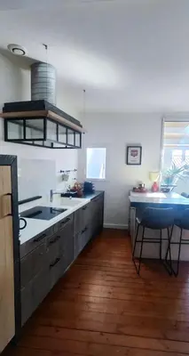 Cuisine ou kitchenette dans l'établissement Charmant appartement cosy en plein centre