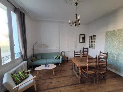 Coin salon dans l'établissement Appartement de charme dans une maison de maître