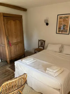 Un ou plusieurs lits dans un hébergement de l'établissement Handsome House