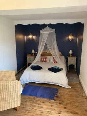 Un ou plusieurs lits dans un hébergement de l'établissement Handsome House