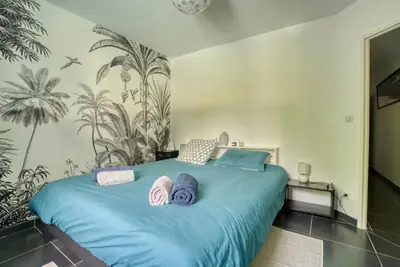 Un ou plusieurs lits dans un hébergement de l'établissement Villa Moderne Piscine - 6p - Calme - Angoulême