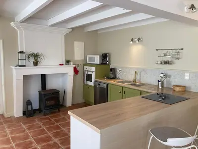 Cuisine ou kitchenette dans l'établissement Gîte des Vignes