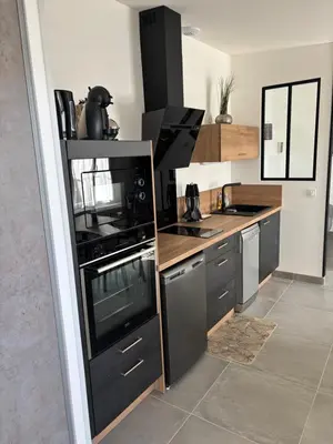 Cuisine ou kitchenette dans l'établissement T2 neuf avec terrasse privative proche gare