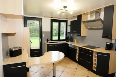 Cuisine ou kitchenette dans l'établissement Au Lit D'Ô