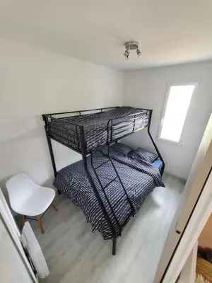 Un ou plusieurs lits dans un hébergement de l'établissement Petite maison proche rivière