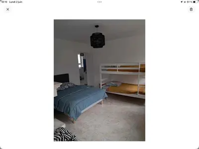Un ou plusieurs lits dans un hébergement de l'établissement Gîte La Maison d Hélène