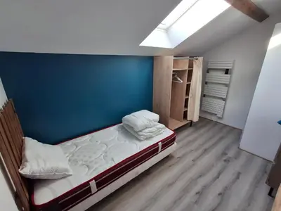 Un ou plusieurs lits dans un hébergement de l'établissement Gîte au milieu de la campagne