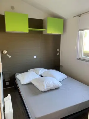 Un ou plusieurs lits dans un hébergement de l'établissement Mobil home Bahia DUO Prenium