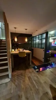 Télévision ou salle de divertissement dans l'établissement Love Room L'Entre Nous