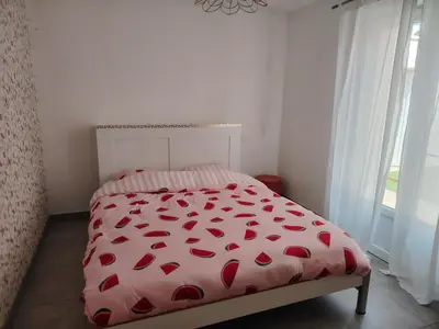 Un ou plusieurs lits dans un hébergement de l'établissement Maison petit havre de paix