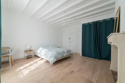 Un ou plusieurs lits dans un hébergement de l'établissement La Bonbonnière maison de ville 10 personnes