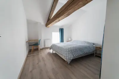 Un ou plusieurs lits dans un hébergement de l'établissement La Bonbonnière maison de ville 10 personnes