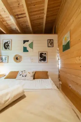 Un ou plusieurs lits dans un hébergement de l'établissement Le Chalet de Limbre