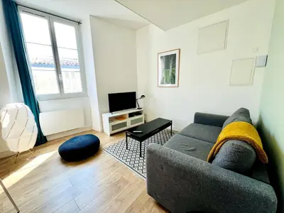 Coin salon dans l'établissement Le Ferte - Coeur de ville