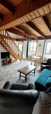 Coin salon dans l'établissement Le Duplex Charentais