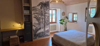 Un ou plusieurs lits dans un hébergement de l'établissement A la Jolie Campagne - chambre et table d'hôtes