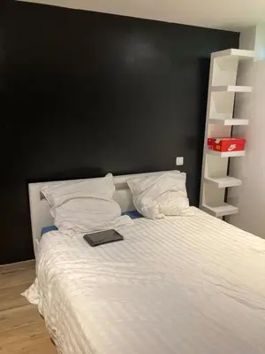 Un ou plusieurs lits dans un hébergement de l'établissement Loft centre ville à saintes