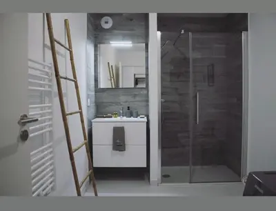 Salle de bains dans l'établissement T2 Cosy avec Terrasse et Jardinet