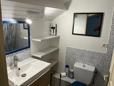 Salle de bains dans l'établissement La Maison du Bonheur