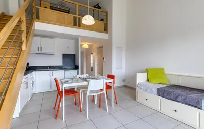 Cuisine ou kitchenette dans l'établissement Appartement Proche Plage