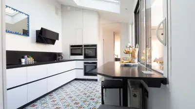 Cuisine ou kitchenette dans l'établissement Maison en hyper centre, à 50 mètres de la plage