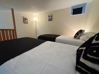 Un ou plusieurs lits dans un hébergement de l'établissement Les Apparts du Valois, Cognac Centre